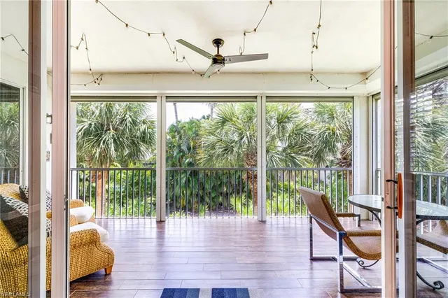 a view of a living room and hardwood floor