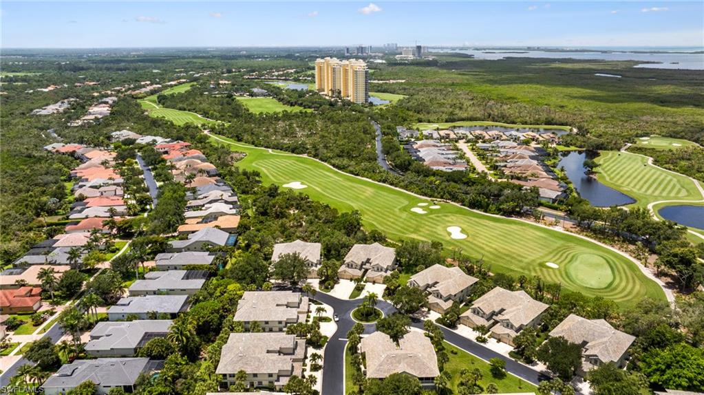 19081 Ridgepoint Drive, Unit 202 Estero, FL 33928 - Photo 35 of 50 an aerial view of residential houses with outdoor space