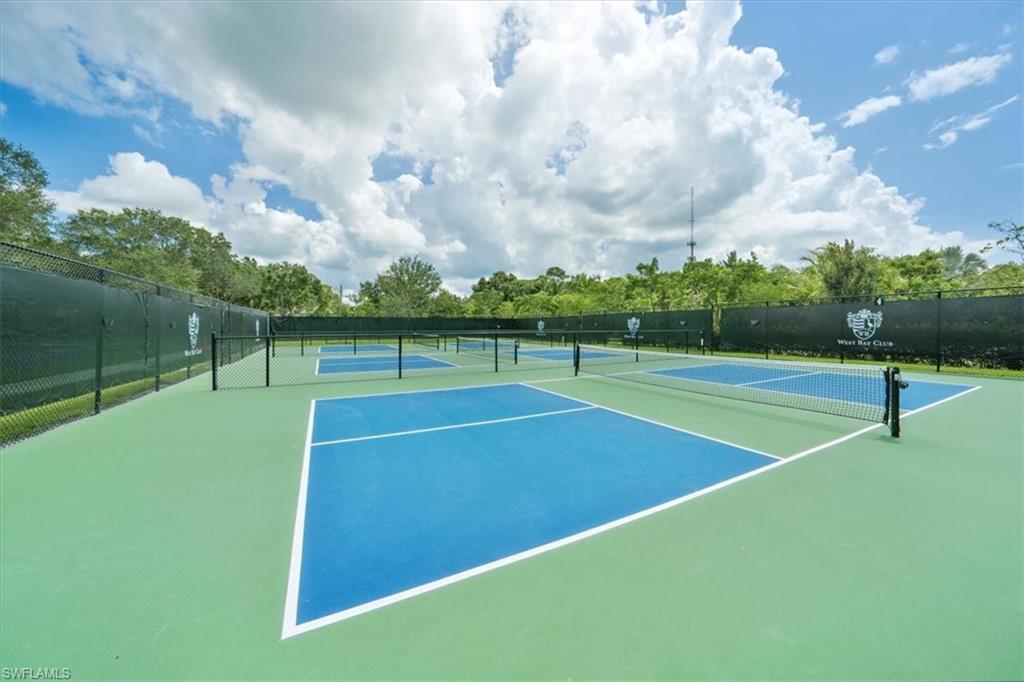 19081 Ridgepoint Drive, Unit 202 Estero, FL 33928 - Photo 42 of 50 a view of a tennis court