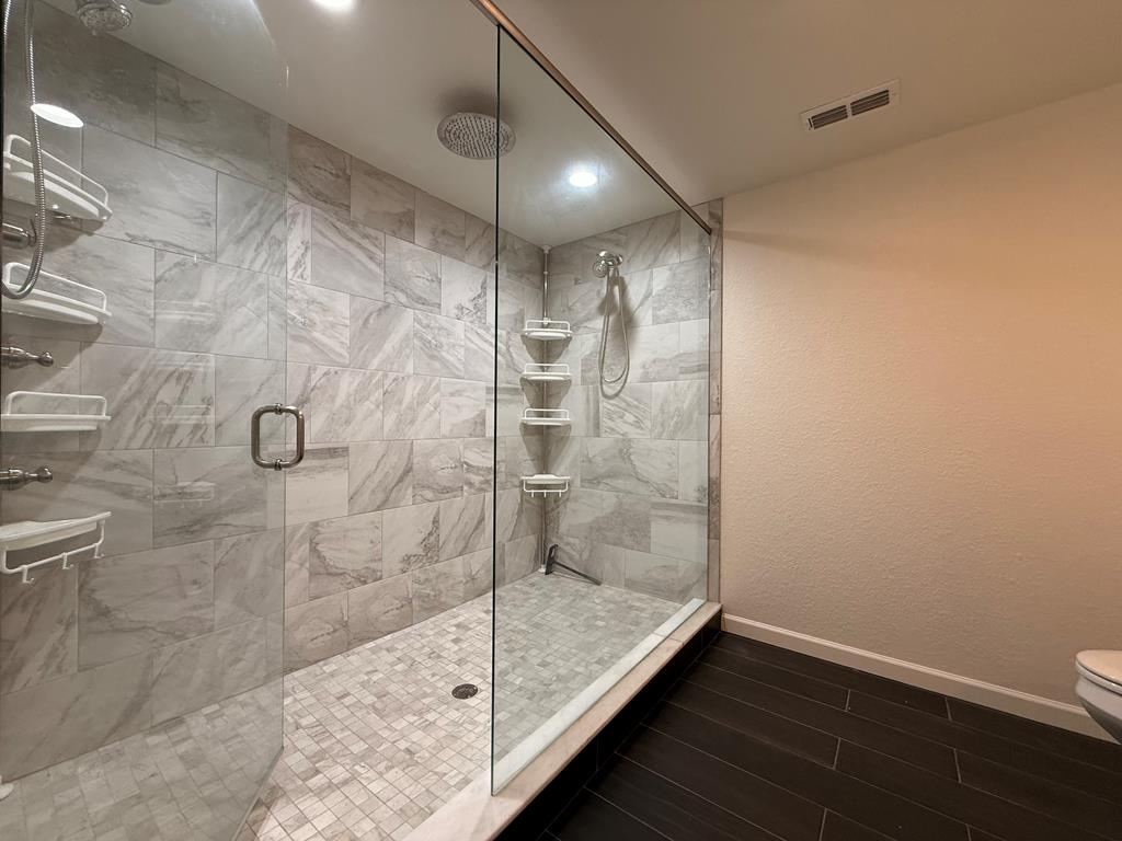 271 Postelle Road Copperhill, TN 37317 - Photo 12 of 59 a bathroom with a shower and a toilet