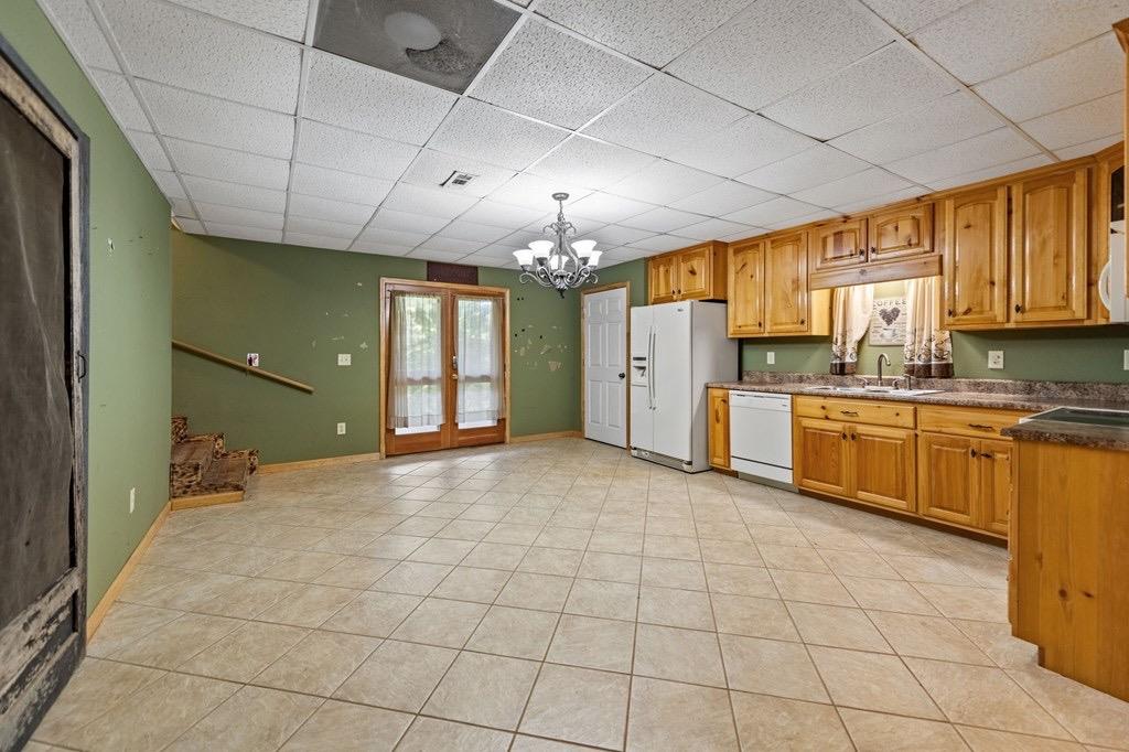 271 Postelle Road Copperhill, TN 37317 - Photo 25 of 59 a view of a kitchen with a sink and cabinets