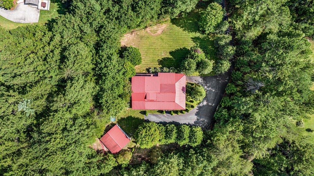 271 Postelle Road Copperhill, TN 37317 - Photo 47 of 59 an aerial view of a house with swimming pool and garden space