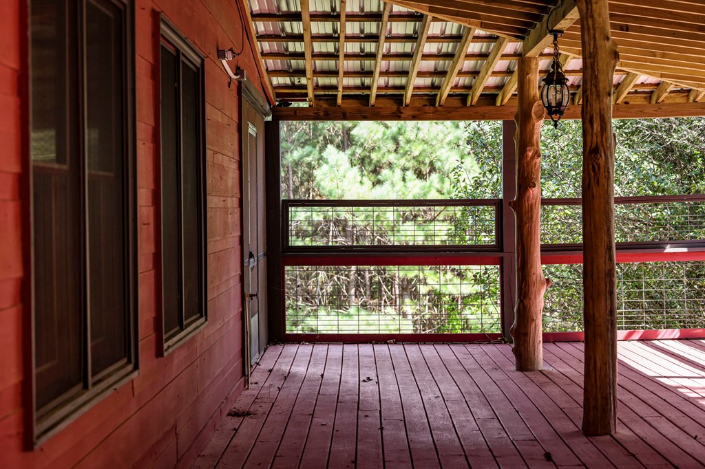 271 Postelle Road Copperhill, TN 37317 - Photo 58 of 59 a view of porch with wooden floor