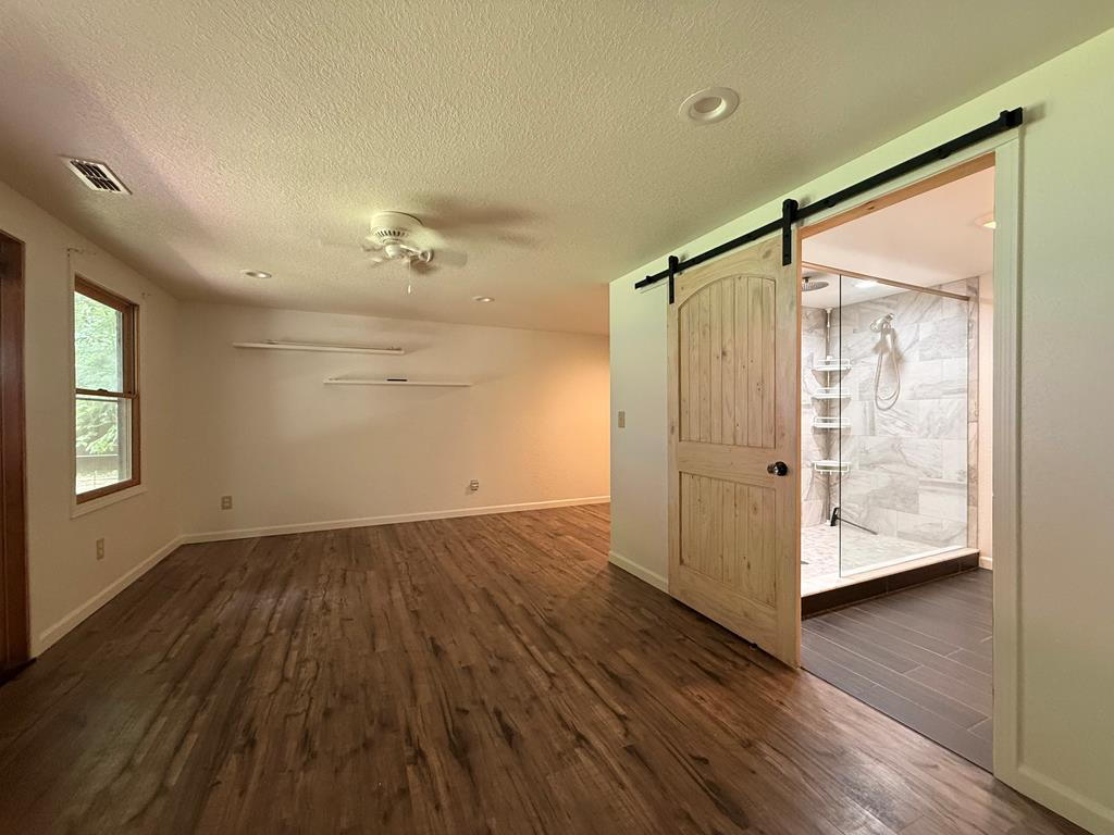 271 Postelle Road Copperhill, TN 37317 - Photo 10 of 59 wooden floor in an empty room with a window