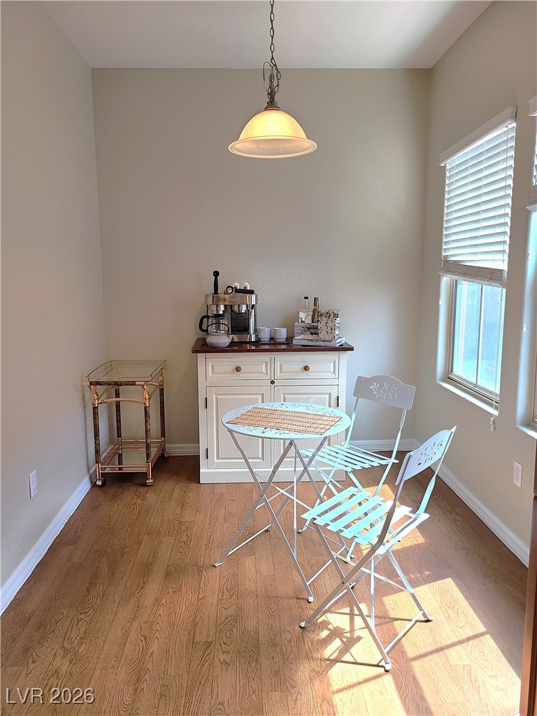 4650 Ranch House Road, Unit 70 North Las Vegas, NV 89031 - Photo 9 of 28 Dining space with light wood-style floors and baseboards