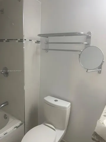 a view of a balcony with chairs