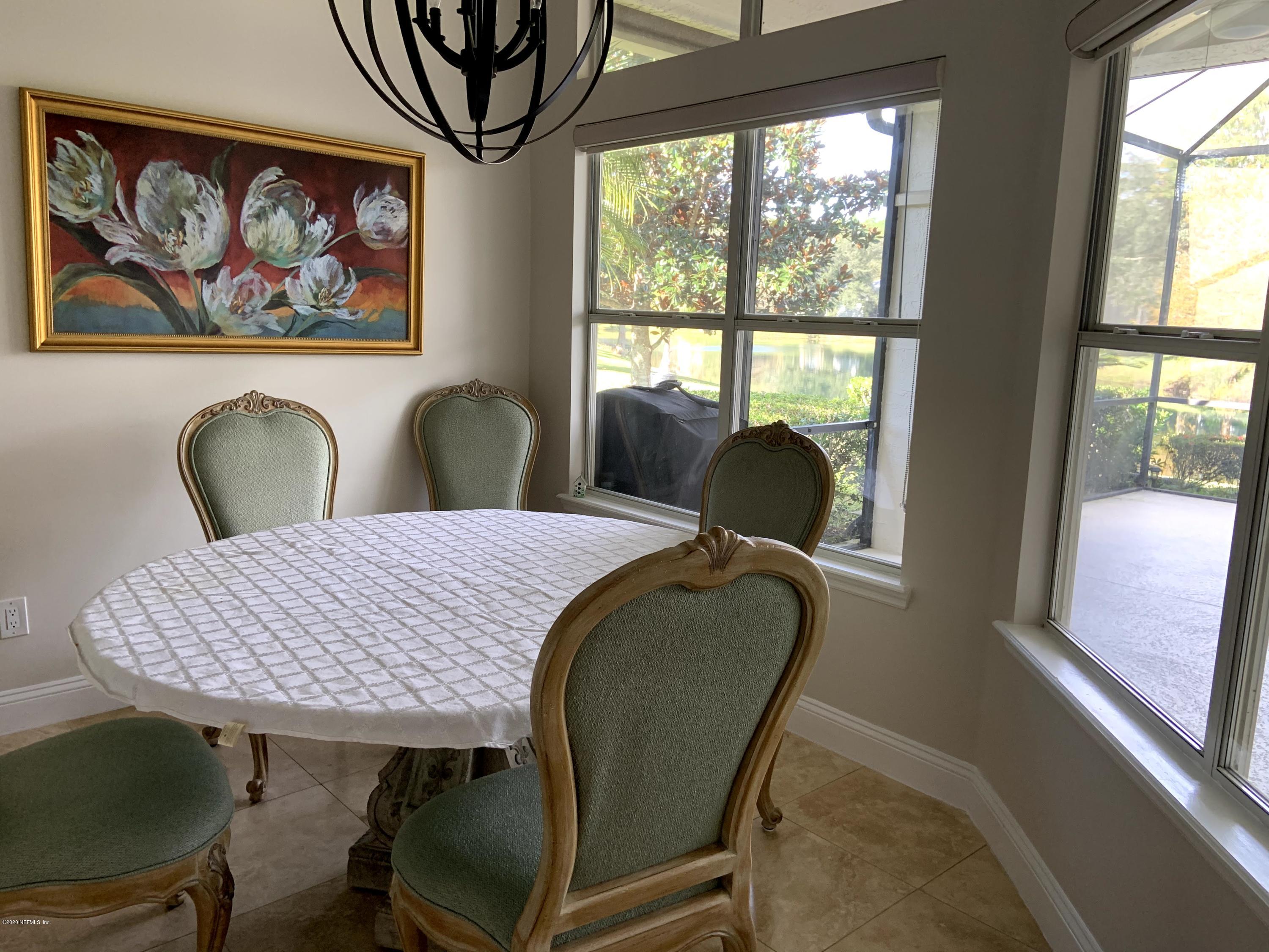 1144 Sandlake Road St. Augustine, FL 32092 - Photo 7 of 11 a view of a dining room with furniture and window