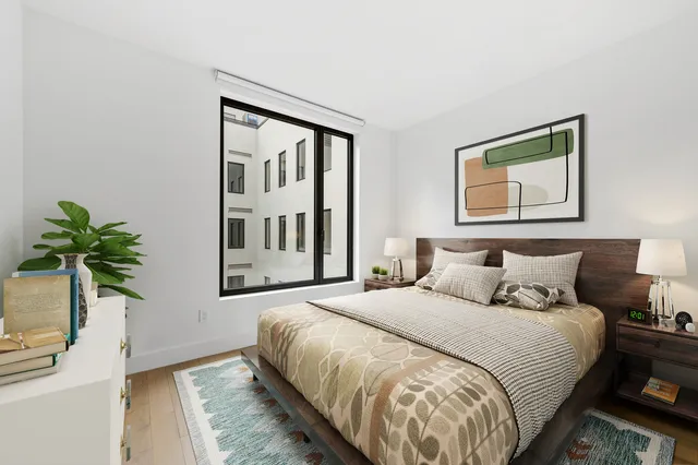 a living room with furniture fireplace and flat screen tv