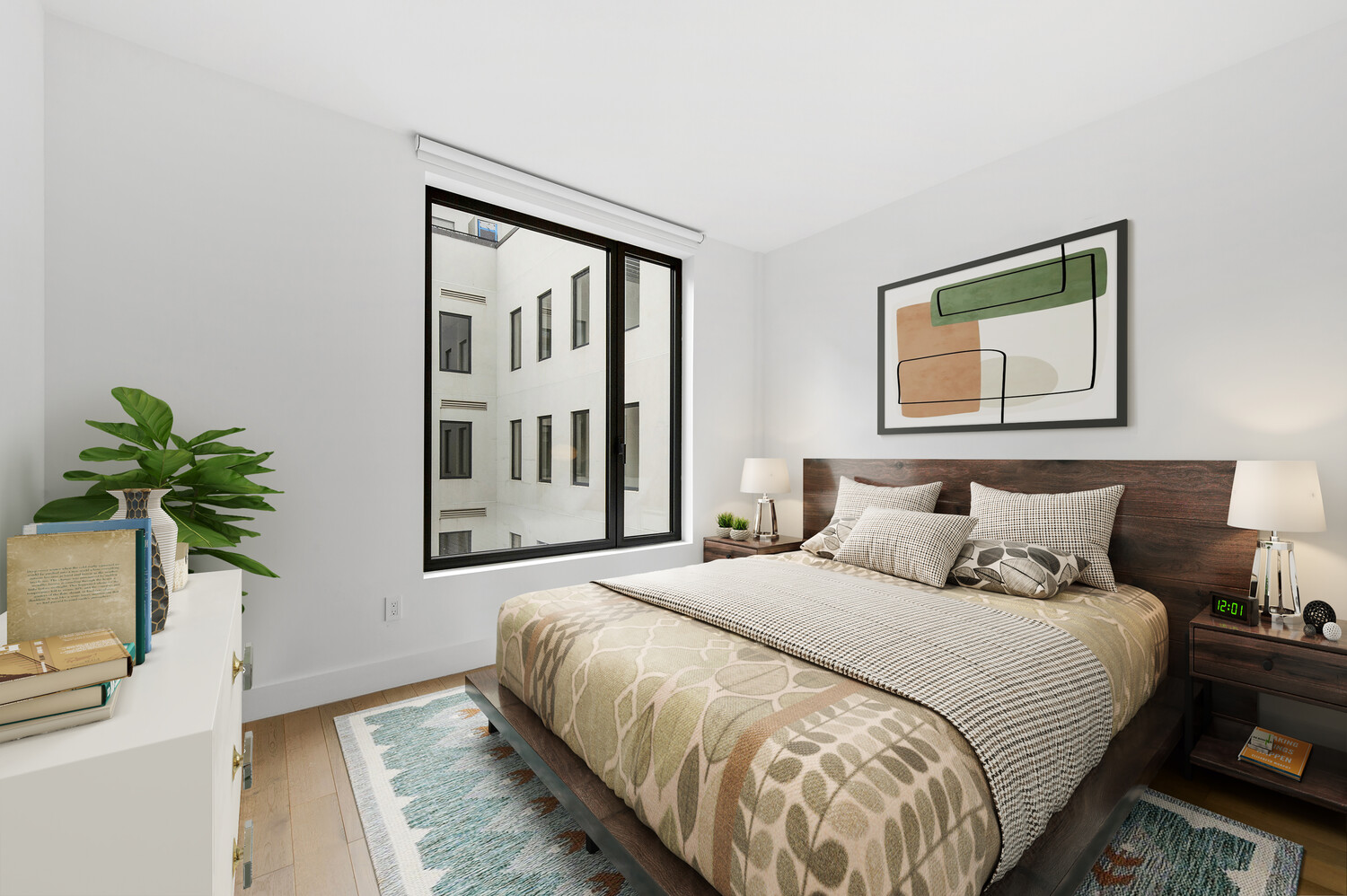 78 Amity Street, Unit 4A Brooklyn, NY 11201 - Photo 3 of 8 a bedroom with a large bed and a potted plant