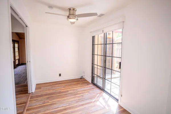 a view of a room with racks on the wall