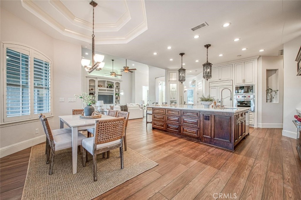 1867 North Rector Avenue Clovis, CA 93619 - Photo 16 of 49 a large kitchen with a table and chairs