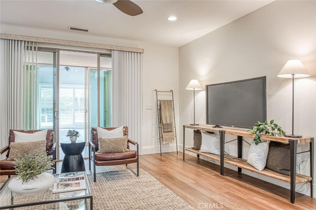 1867 North Rector Avenue Clovis, CA 93619 - Photo 20 of 49 a living room with furniture and a large window