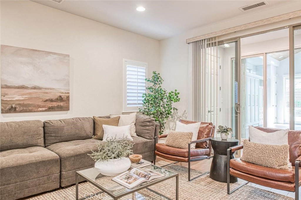 1867 North Rector Avenue Clovis, CA 93619 - Photo 22 of 49 a living room with furniture and a large window