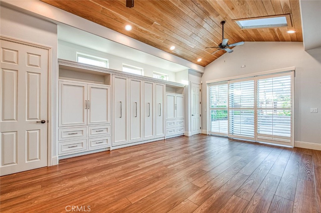 1867 North Rector Avenue Clovis, CA 93619 - Photo 24 of 49 en empty room with wooden floor and windows