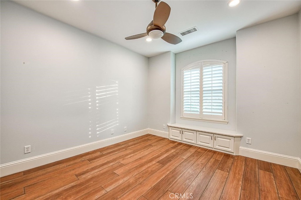 1867 North Rector Avenue Clovis, CA 93619 - Photo 25 of 49 wooden floor in an empty room with a window