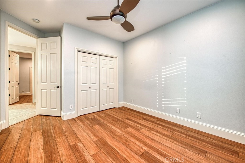 1867 North Rector Avenue Clovis, CA 93619 - Photo 26 of 49 wooden floor in an empty room with a window