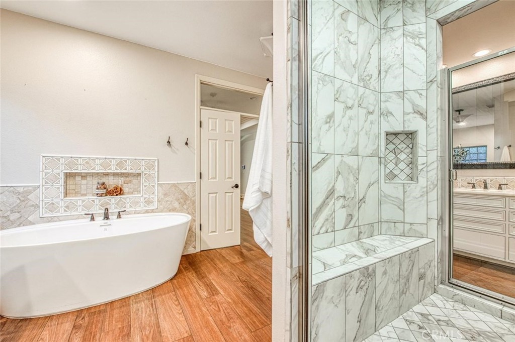 1867 North Rector Avenue Clovis, CA 93619 - Photo 33 of 49 a bathroom with a bathtub and shower