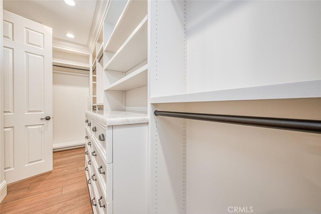 1867 North Rector Avenue Clovis, CA 93619 - Photo 35 of 49 a kitchen with a refrigerator and white cabinets