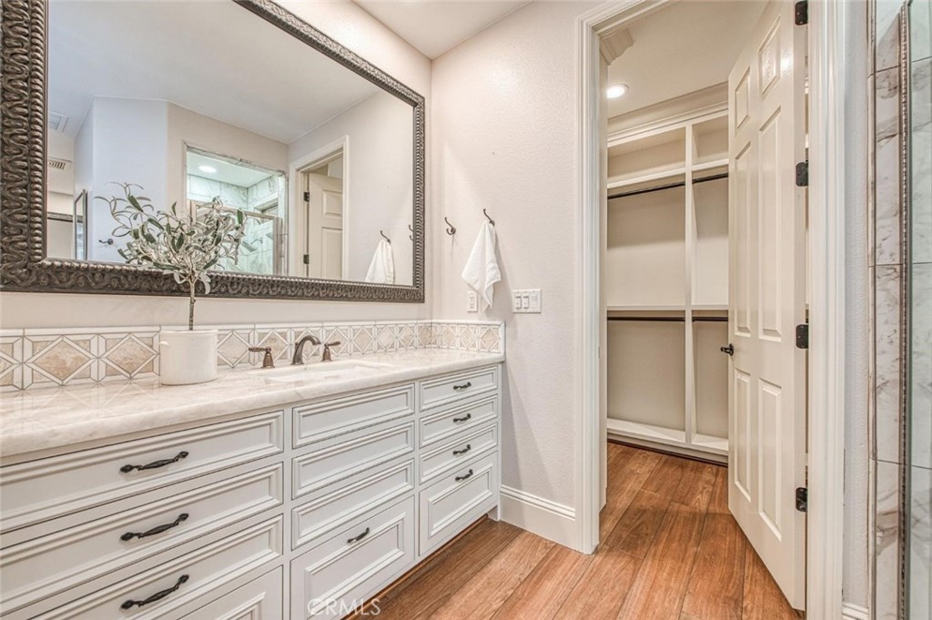 1867 North Rector Avenue Clovis, CA 93619 - Photo 36 of 49 a view of bathroom with a hardwood floor and a sink