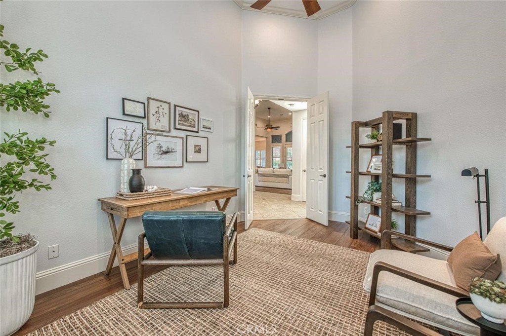 1867 North Rector Avenue Clovis, CA 93619 - Photo 4 of 49 a workspace with furniture and book shelf