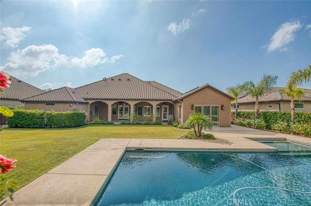 1867 North Rector Avenue Clovis, CA 93619 - Photo 41 of 49 a front view of a house with garden