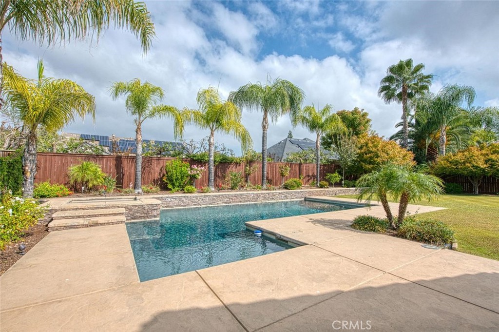 1867 North Rector Avenue Clovis, CA 93619 - Photo 43 of 49 a view of a yard and palm trees