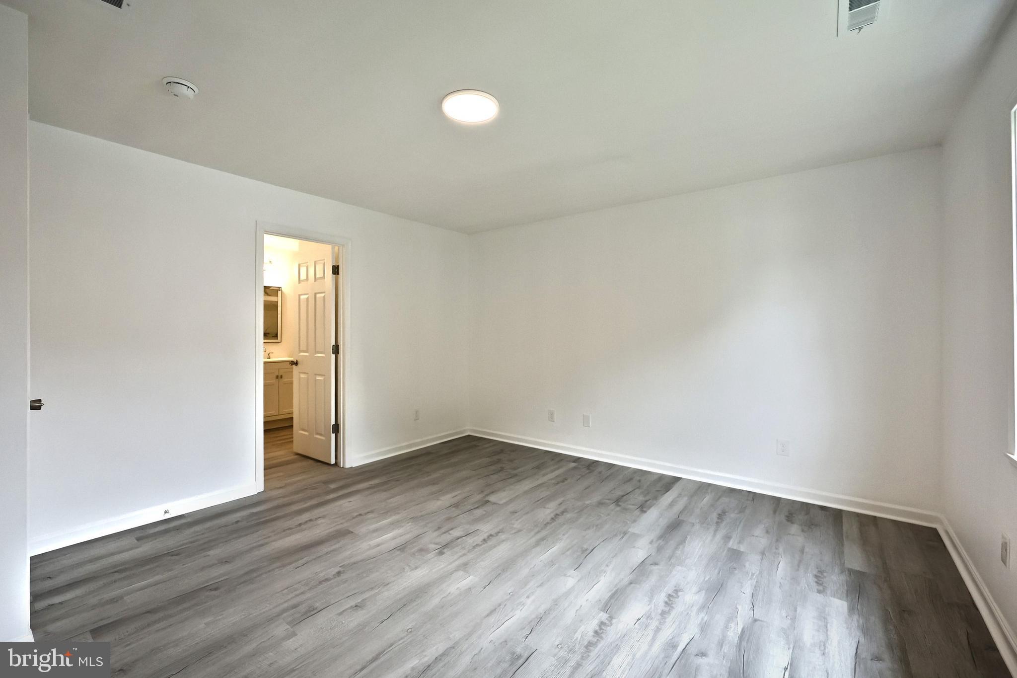 413 Springbrook Court Hanover, PA 17331 - Photo 14 of 32 First floor primary with walk-in closet & en-suite