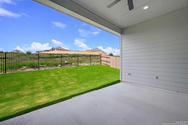 a view of a garden from a balcony