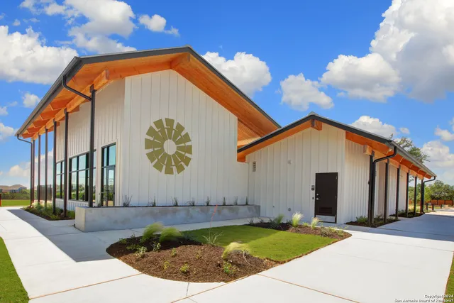 a view of a house with entertaining space