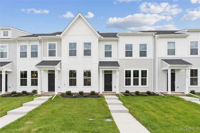 front view of a house with a yard