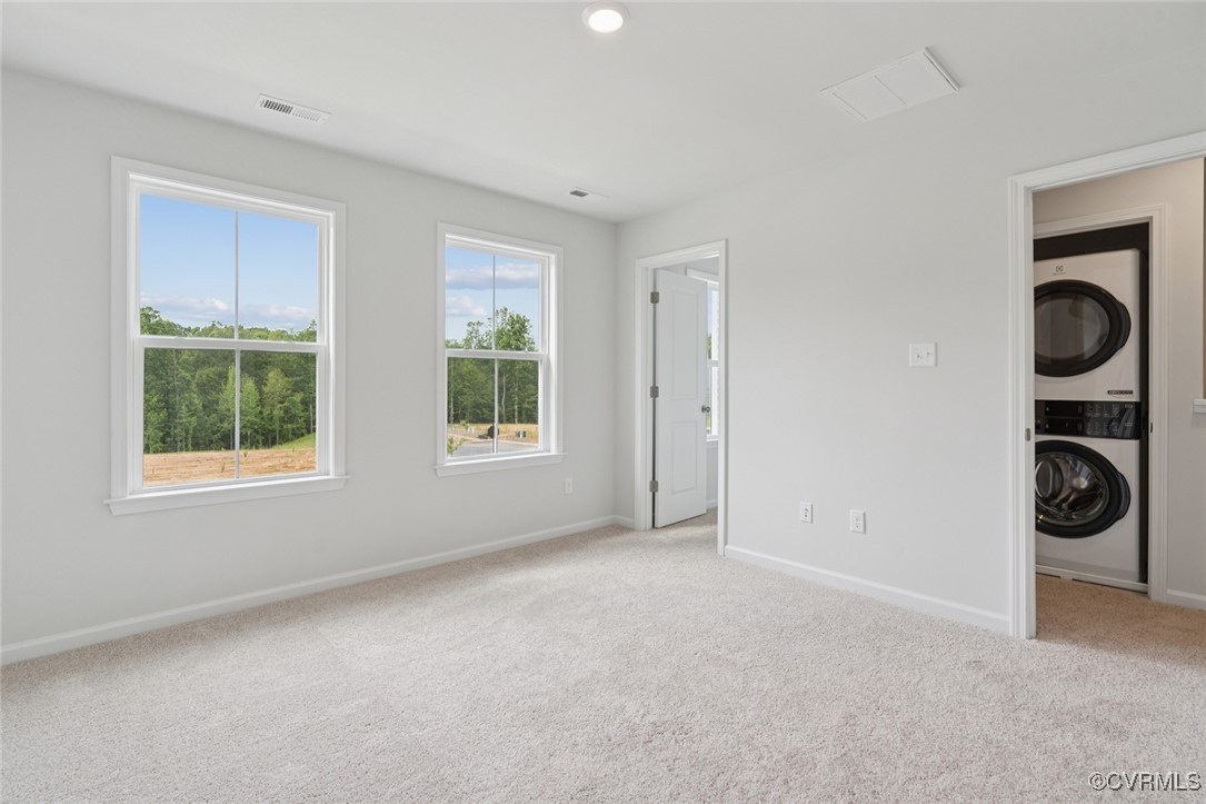 327 Mt Mccauley Way Aylett, VA 23009 - Photo 12 of 50 a view of an empty room with window and hardwood floor