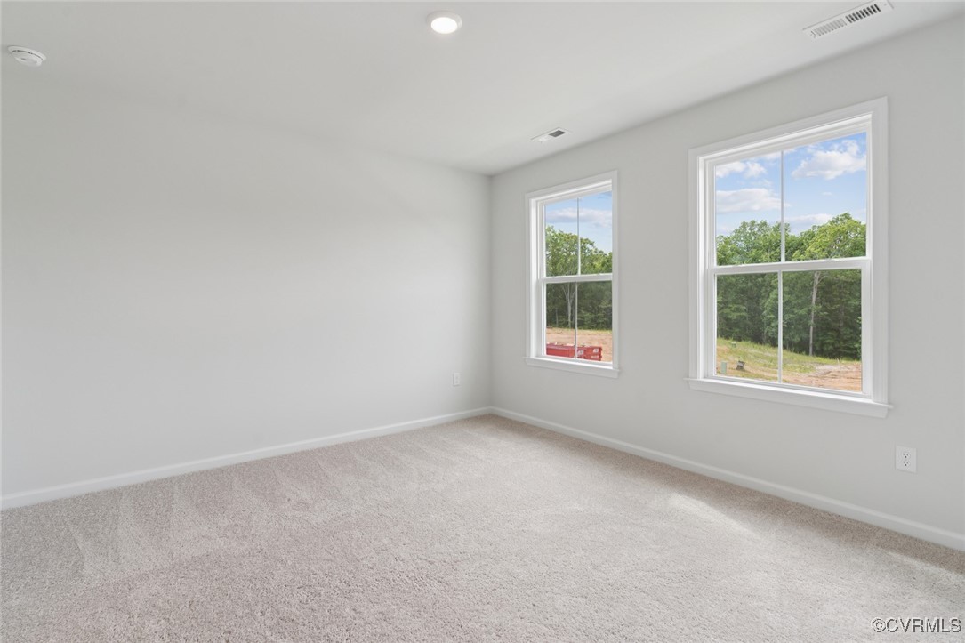 327 Mt Mccauley Way Aylett, VA 23009 - Photo 15 of 50 an empty room with windows