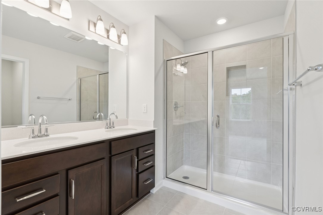 327 Mt Mccauley Way Aylett, VA 23009 - Photo 17 of 50 a bathroom with a shower sink vanity and mirror