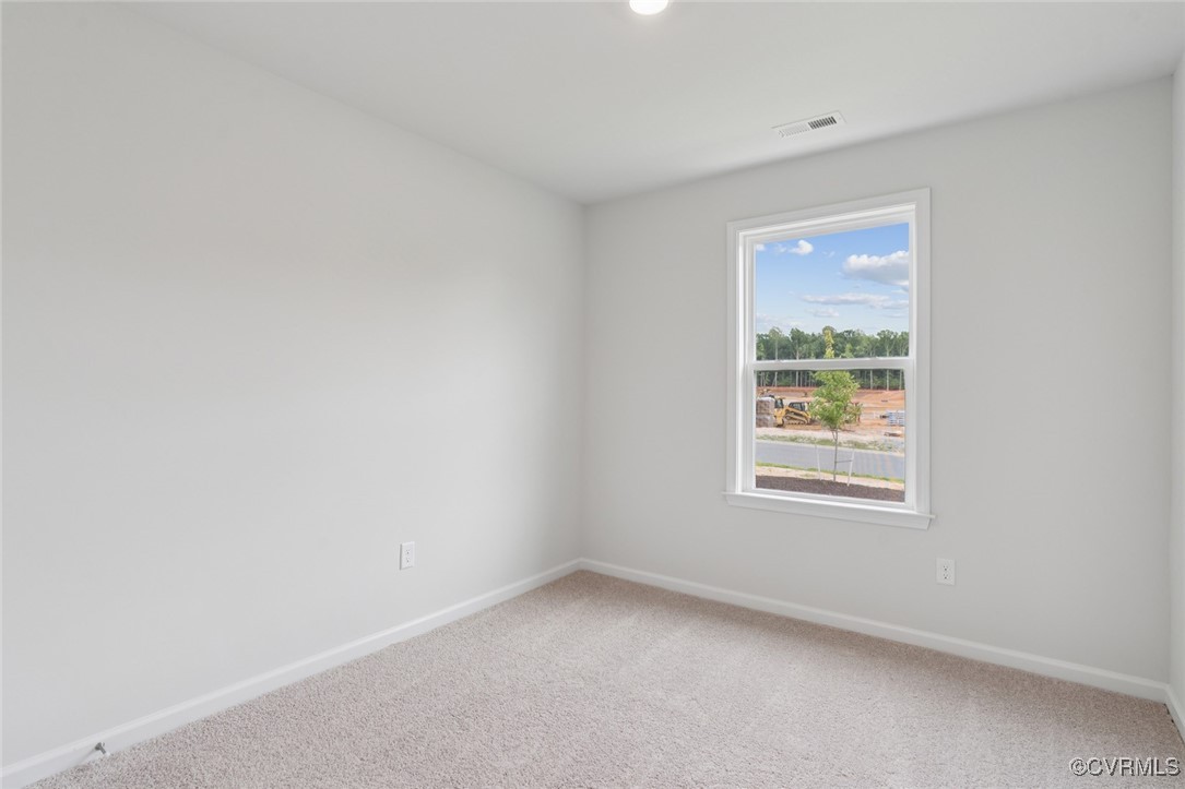 327 Mt Mccauley Way Aylett, VA 23009 - Photo 18 of 50 an empty room with a window