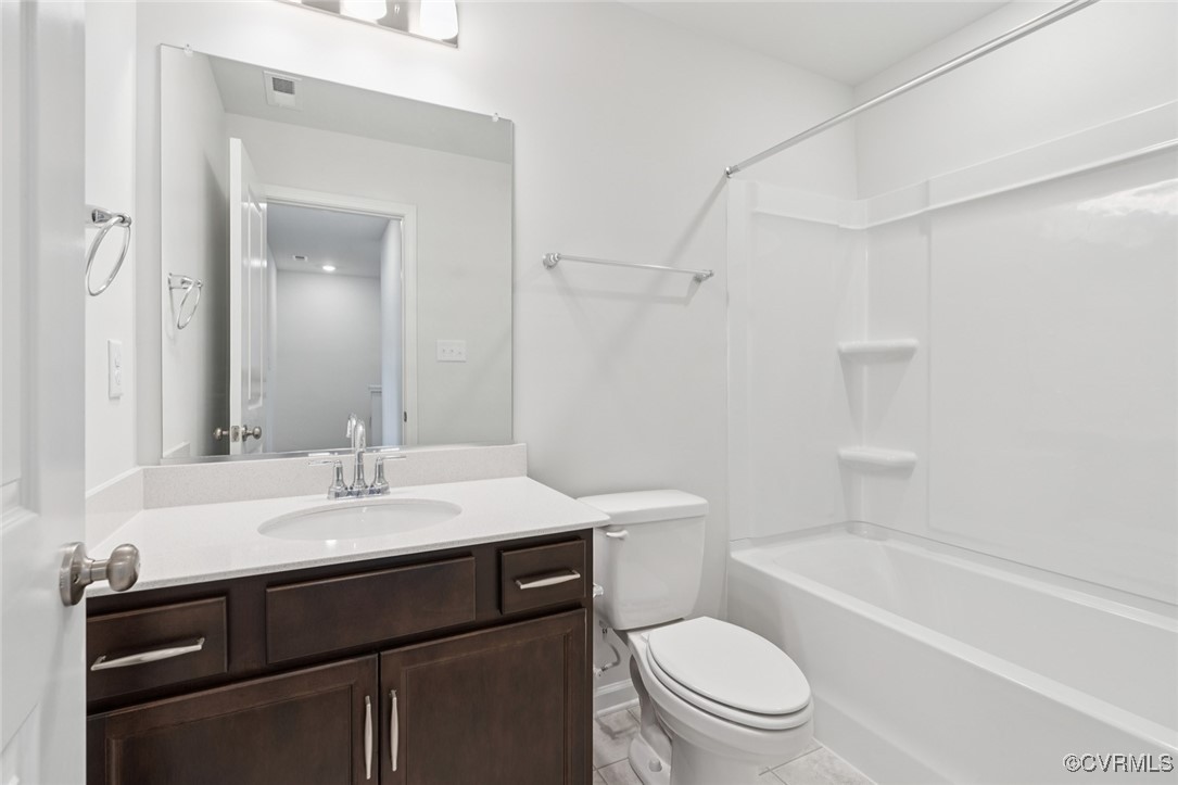 327 Mt Mccauley Way Aylett, VA 23009 - Photo 20 of 50 a bathroom with a sink a toilet and shower