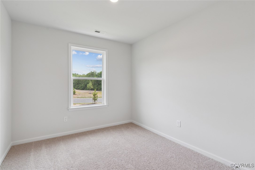 327 Mt Mccauley Way Aylett, VA 23009 - Photo 22 of 50 an empty room with a window