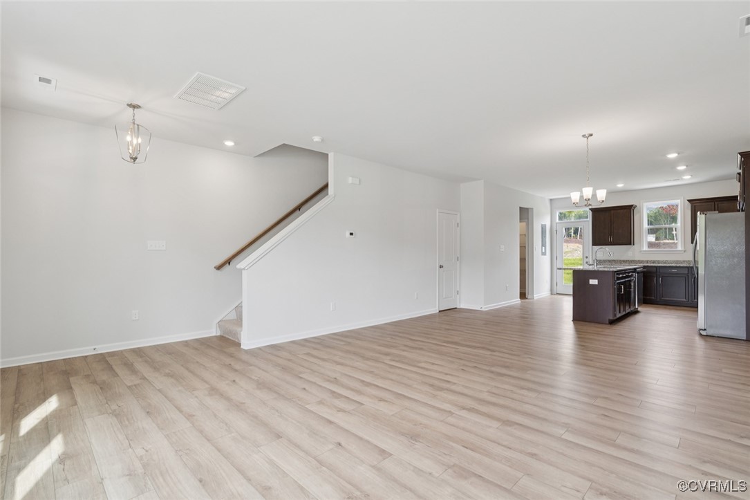 327 Mt Mccauley Way Aylett, VA 23009 - Photo 4 of 50 a view of empty room with wooden floor
