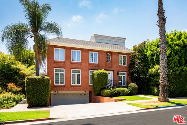 a view of a building with a swimming pool