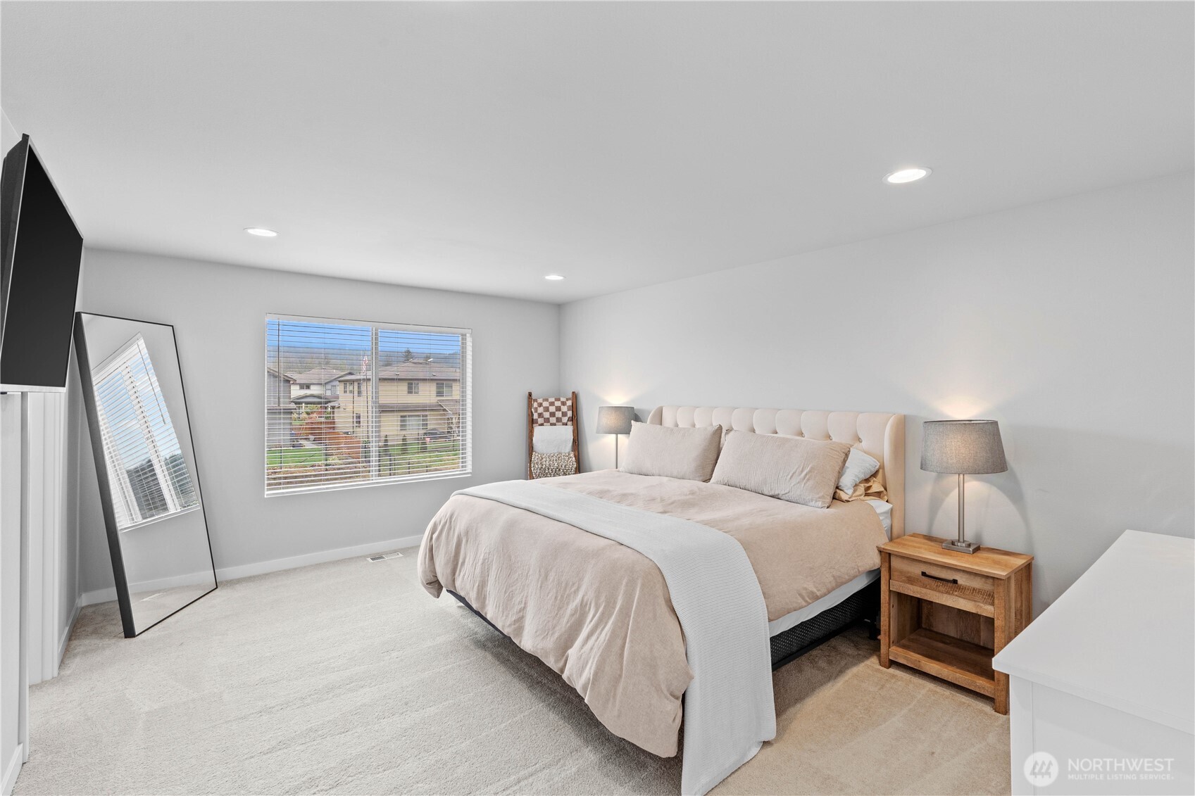 342 South Spruce Street Buckley, WA 98321 - Photo 25 of 34 a bedroom with a bed and a large window