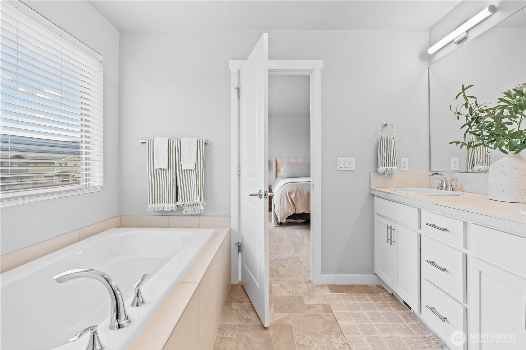 342 South Spruce Street Buckley, WA 98321 - Photo 27 of 34 a spacious bathroom with a tub sink and mirror