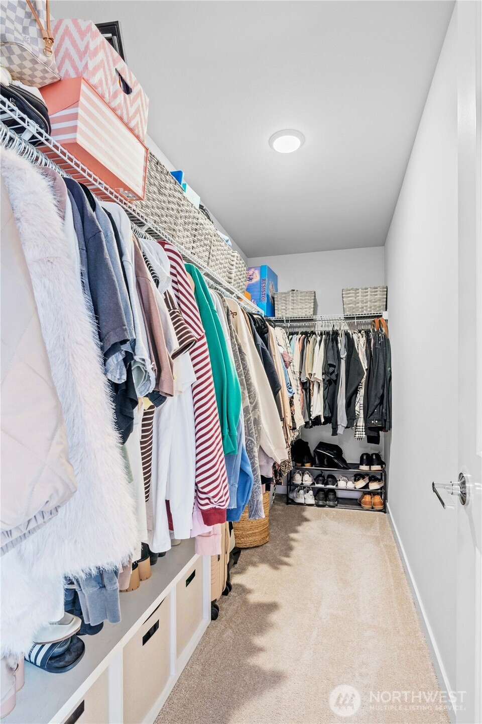 342 South Spruce Street Buckley, WA 98321 - Photo 28 of 34 a view of walk in closet with clothes and shoes