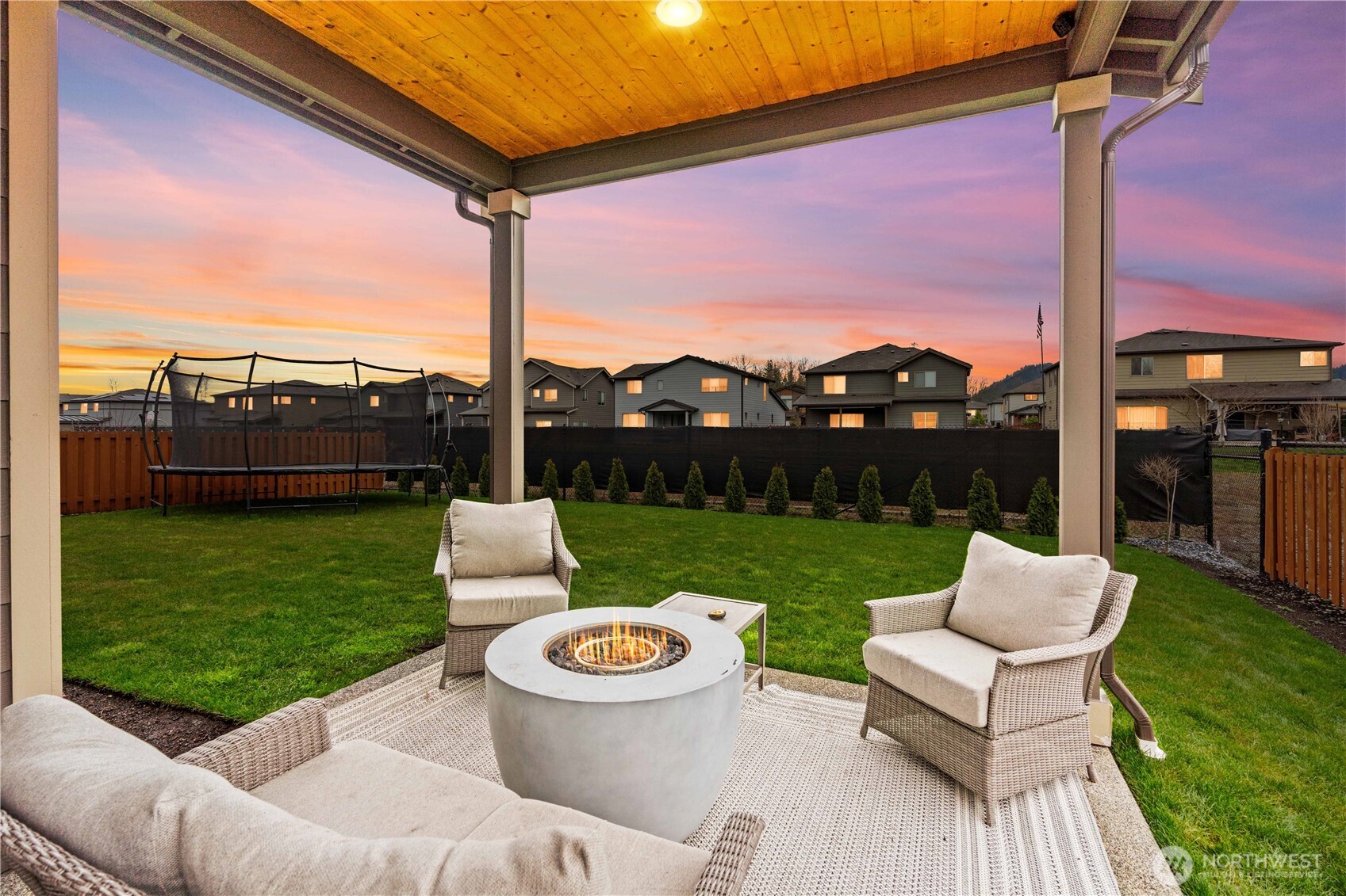 342 South Spruce Street Buckley, WA 98321 - Photo 29 of 34 a view of a patio with couches chairs and a yard