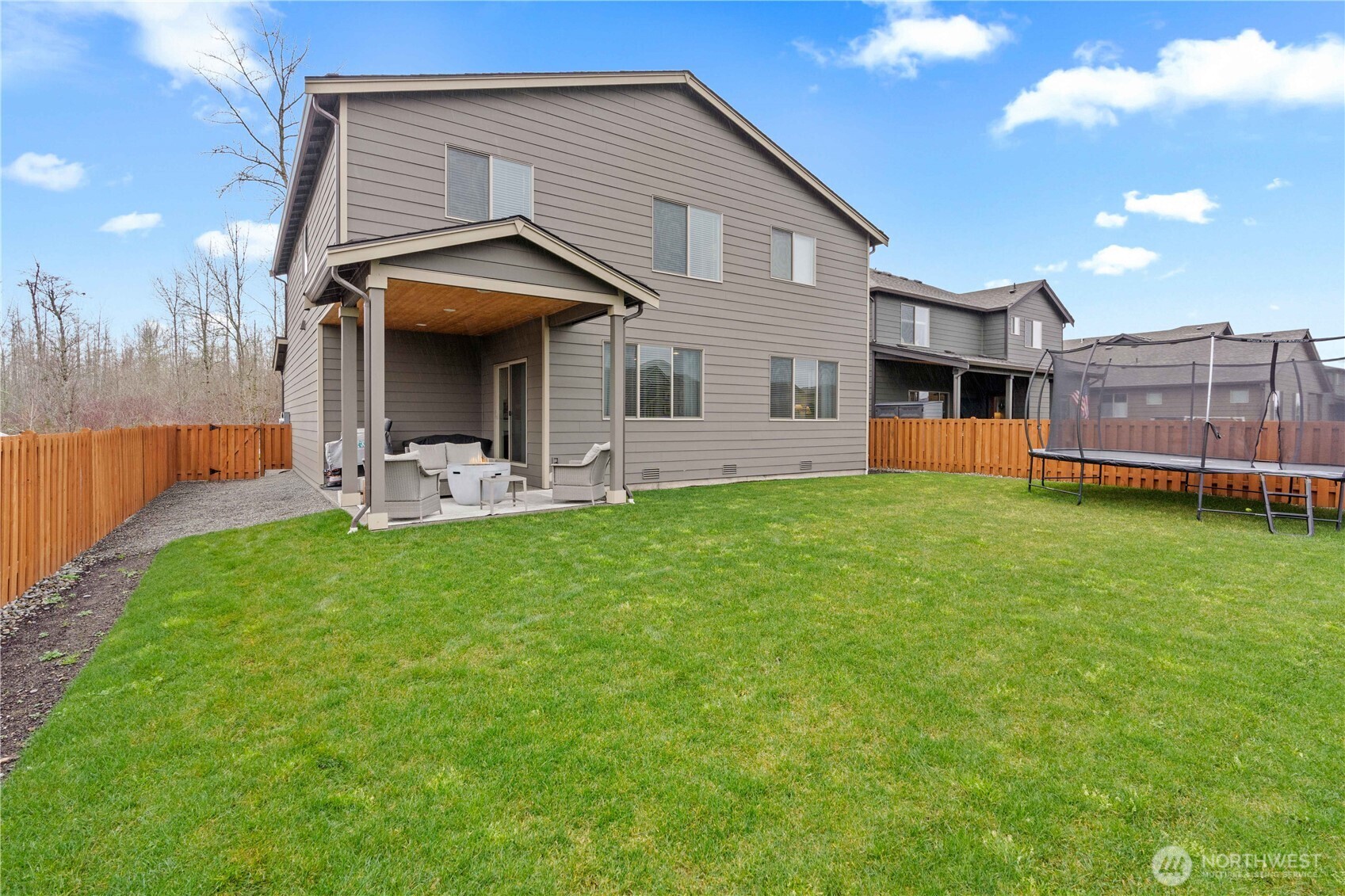 342 South Spruce Street Buckley, WA 98321 - Photo 32 of 34 a view of a house with a yard and sitting area