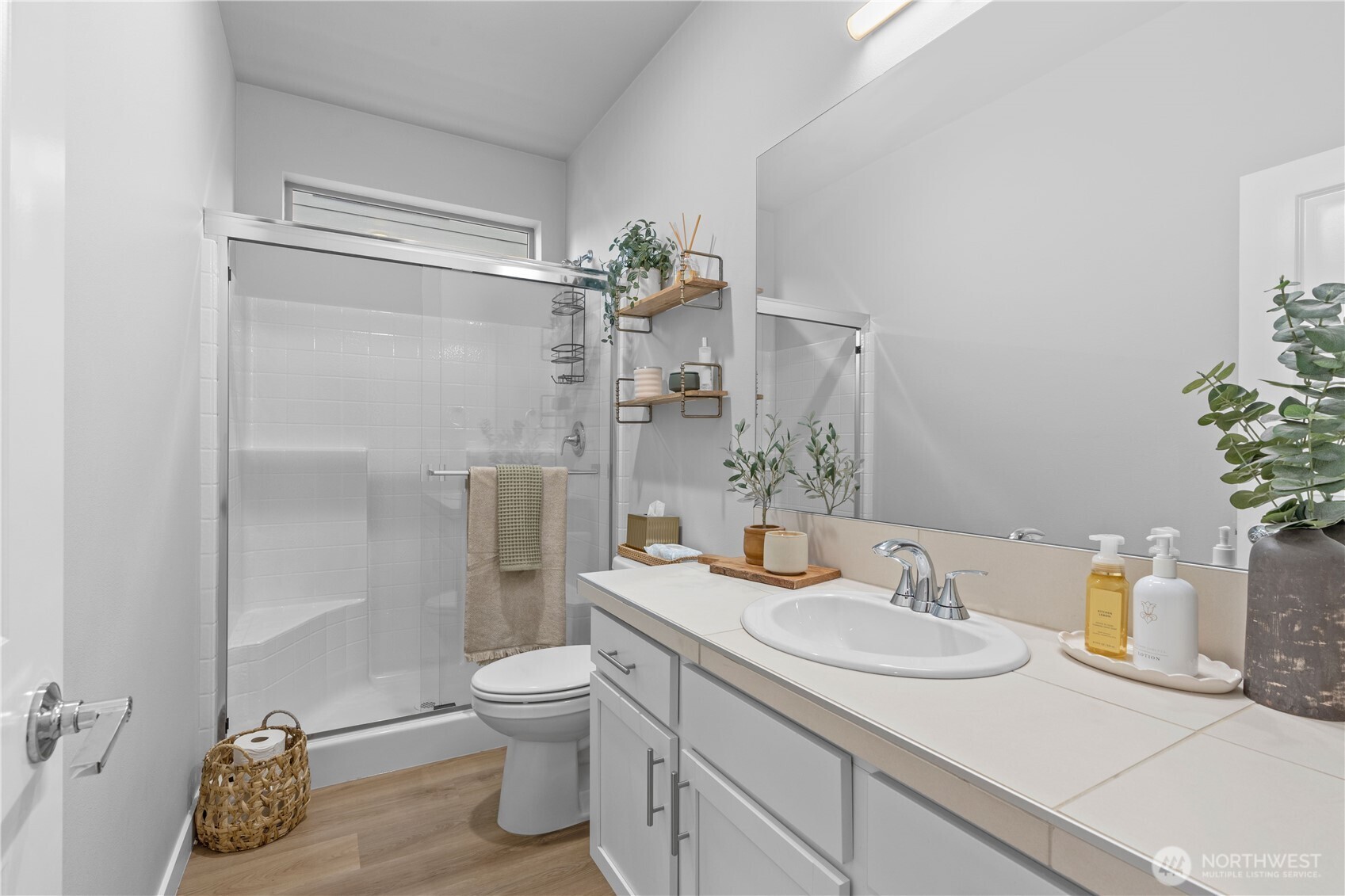 342 South Spruce Street Buckley, WA 98321 - Photo 5 of 34 a bathroom with a granite countertop sink toilet and shower