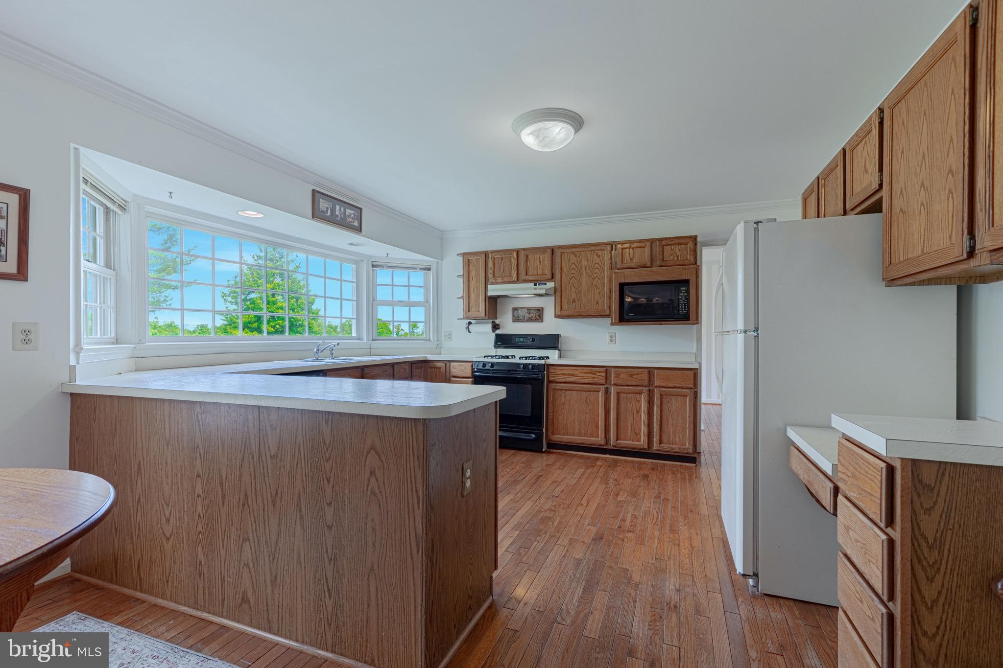 21709 St Louis Road Middleburg, VA 20117 - Photo 11 of 47 View of kitchen from family room.