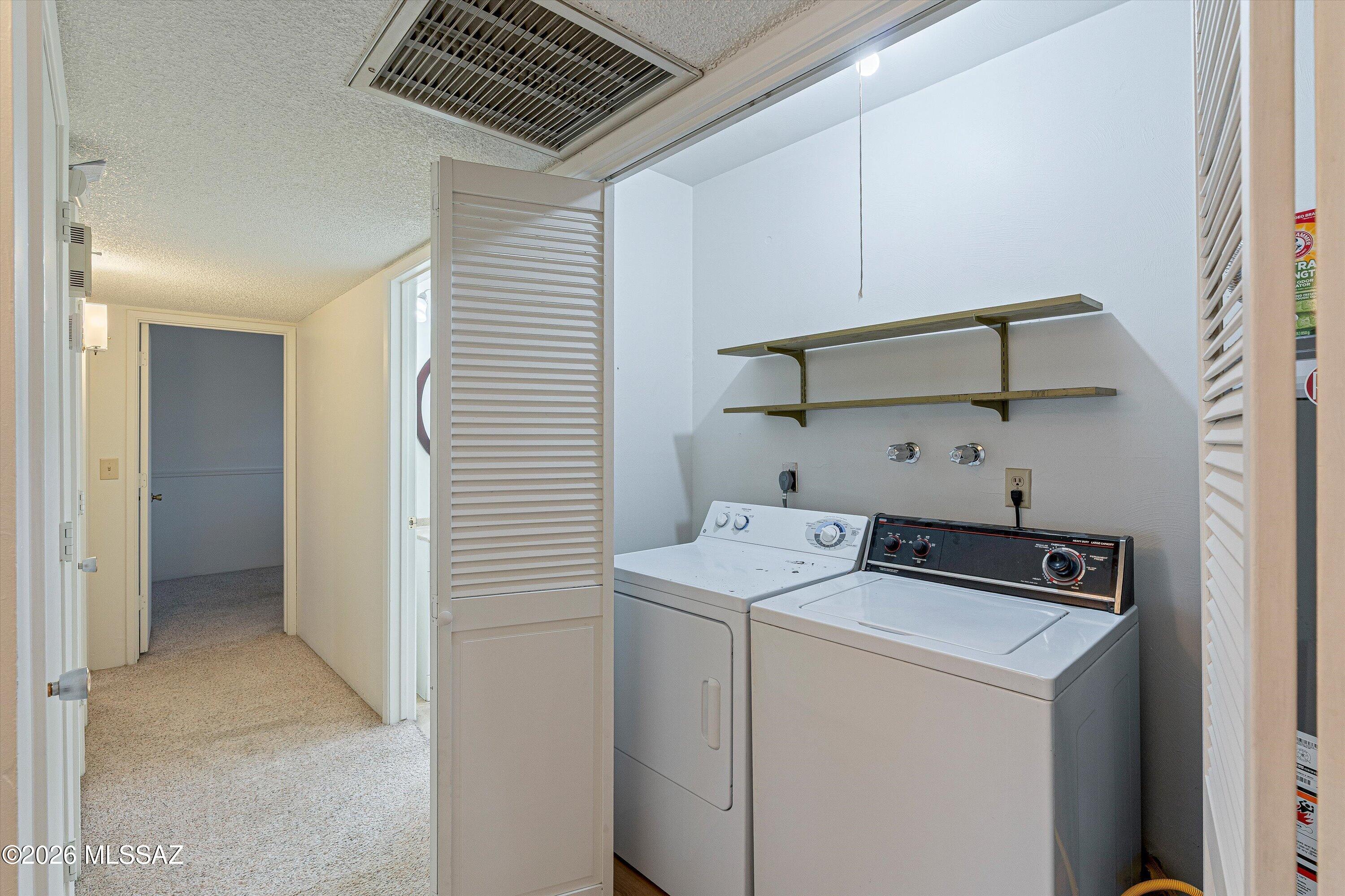 660 East River Road, Unit J Tucson, AZ 85704 - Photo 18 of 27 Laundry Closet