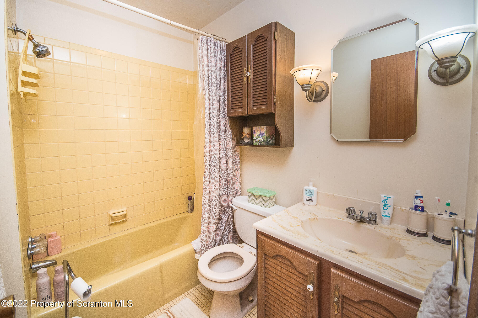 1971 Becks Crossing Road Moscow, PA 18444 - Photo 15 of 31 a bathroom with a granite countertop sink toilet and shower