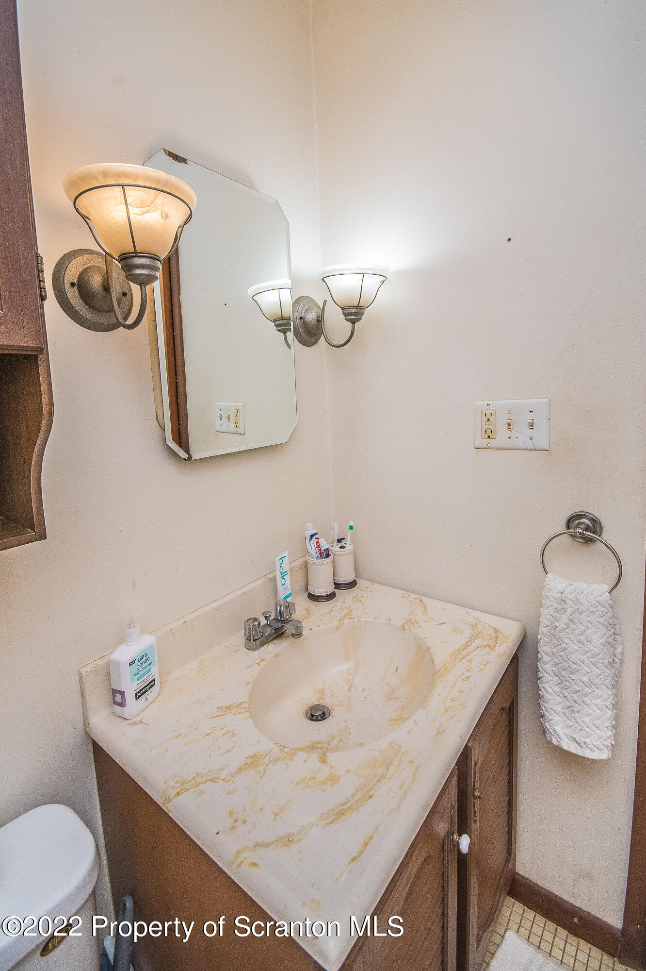 1971 Becks Crossing Road Moscow, PA 18444 - Photo 16 of 31 a bathroom with a sink and a mirror