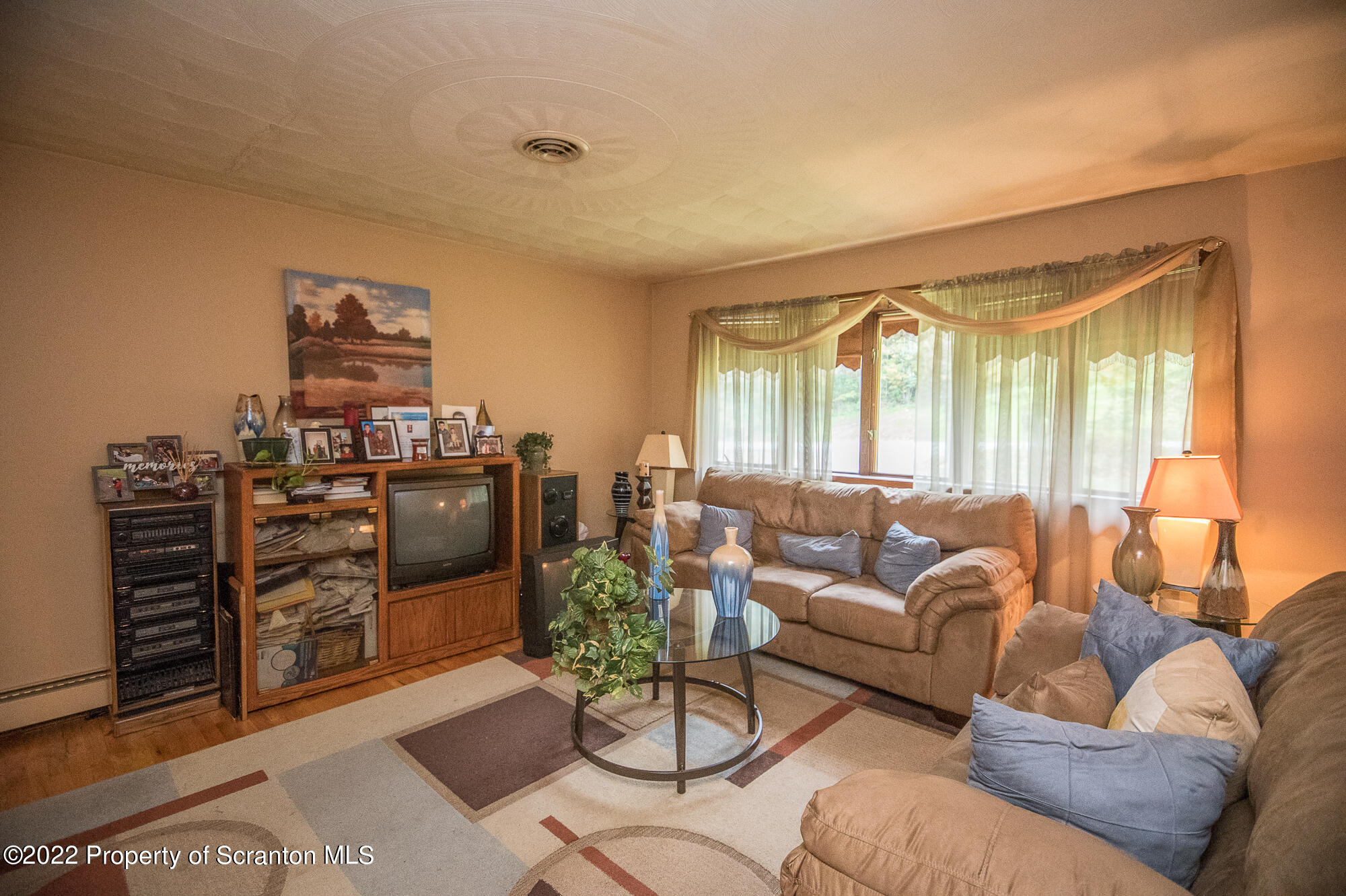 1971 Becks Crossing Road Moscow, PA 18444 - Photo 2 of 31 a living room with furniture and a flat screen tv