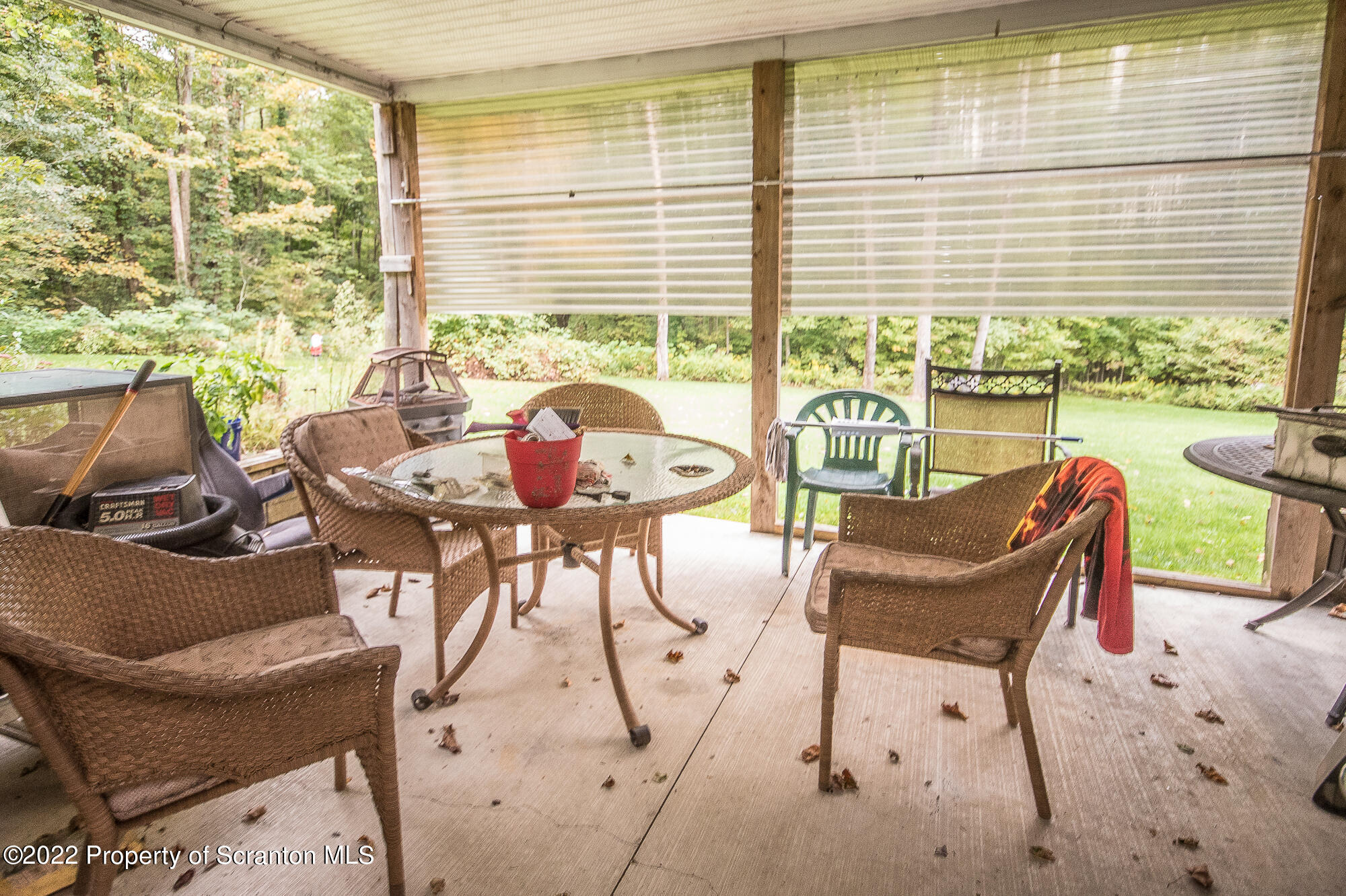 1971 Becks Crossing Road Moscow, PA 18444 - Photo 21 of 31 a living room with furniture and floor to ceiling windows